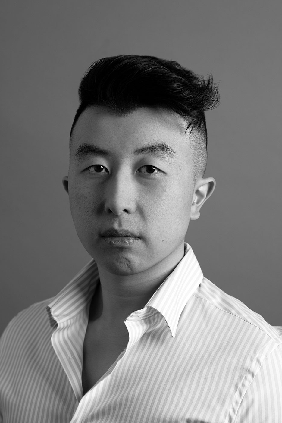 A headshot of an Olympic Industries staff member, highlighting their experience and expertise in the lumber distribution sector in Vancouver, Canada.