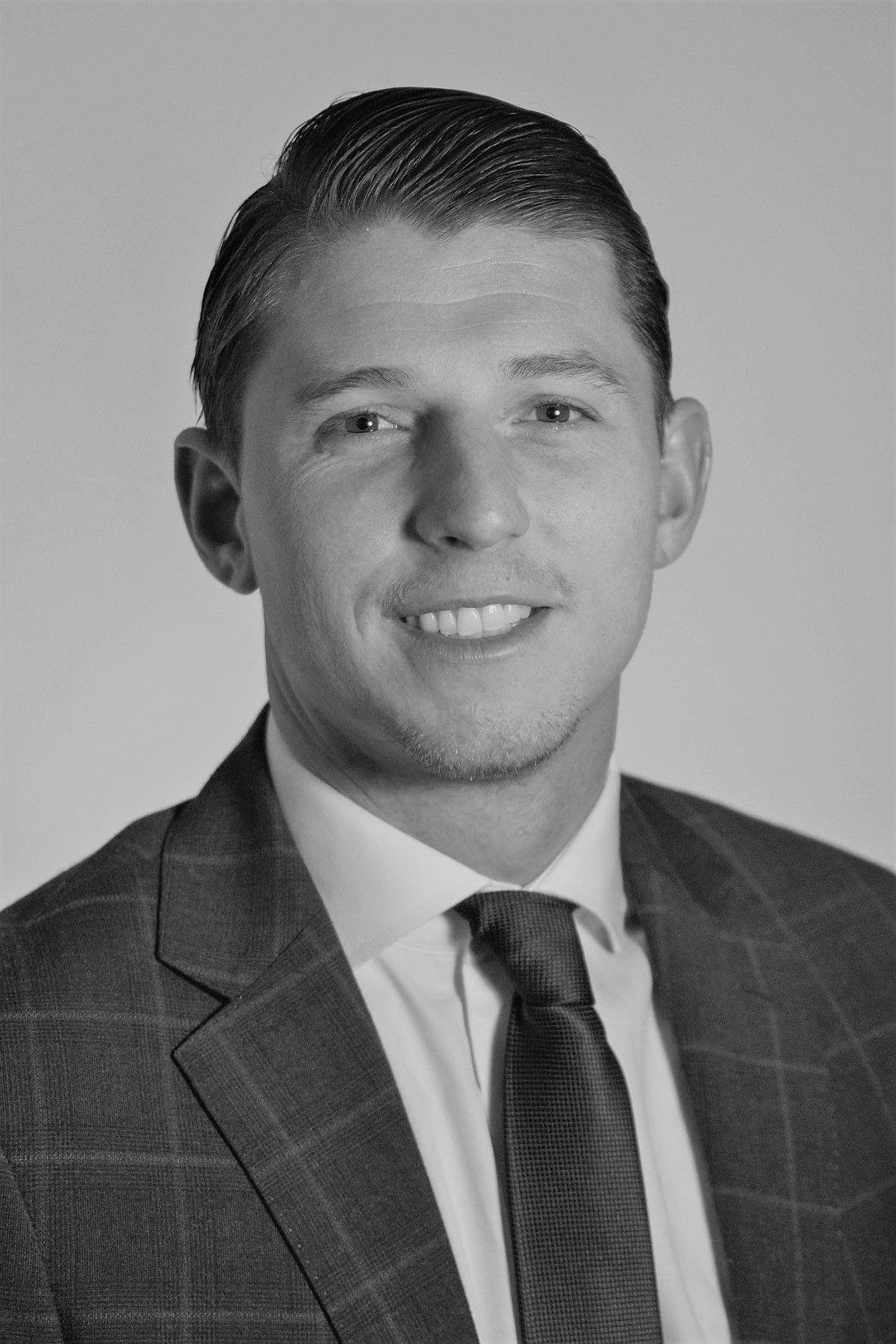 A close-up of an Olympic Industries employee, showcasing their expertise in the building material industry in British Columbia, Canada. Specializing in Pressure-treated plywood.