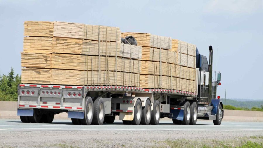 Logistics Truck Delivering Dimensional Lumber in North America